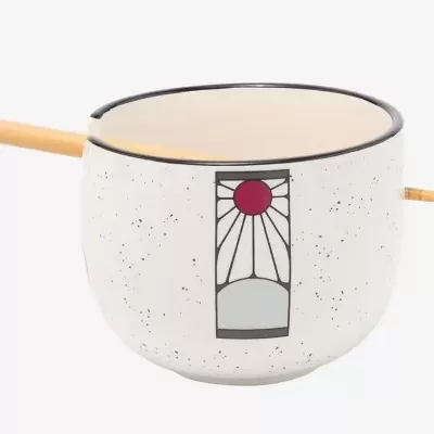 Panela branca em cerâmica com padrão pontilhado preto e alça de madeira