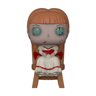 Figura Funko Pop da personagem com cabelo castanho claro e vestido branco com detalhes vermelhos sentada numa cadeira de madeira.