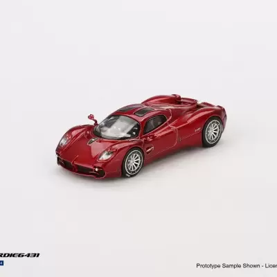 Miniatura de carro desportivo vermelho em escala 1/64