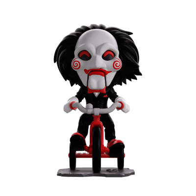 Boneco vinil com máscara branca e cabelo preto numa bicicleta vermelha.