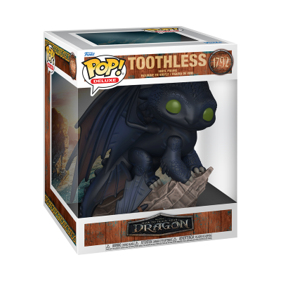 Figura colecionável Pop! Deluxe Toothless em vinil preto com olhos verdes na caixa