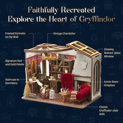 Miniatura da sala de estar estilo Gryffindor com poltronas vermelhas e lareira de pedra