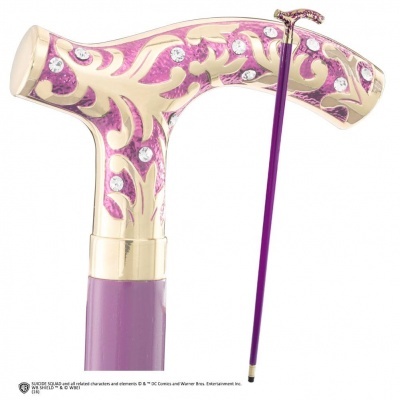 Bengala roxa com decoração dourada e cristais, pega em T