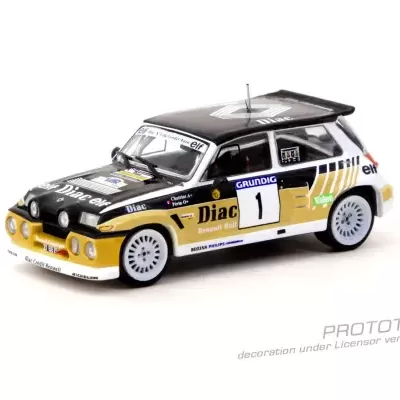 Miniatura de carro de rali preto, branco e dourado com inscrições e número 1.