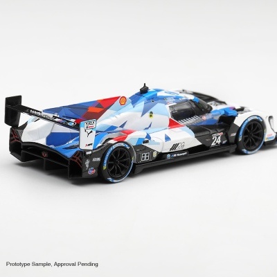 Miniatura de carro de corrida BMW M Motorsport azul, branco e vermelho com asa traseira preta