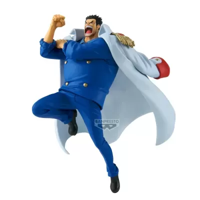Figura de ação masculina com fato azul e capa branca em posição dinâmica