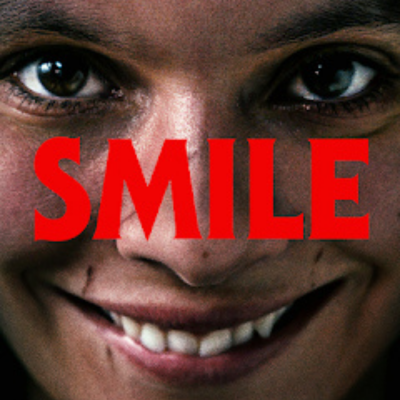 Rosto sorridente com a palavra SMILE em vermelho sobreposta