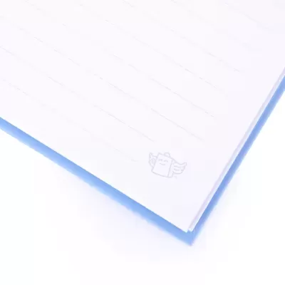 Bloco de papel branco pautado com ilustração de caneca com asas