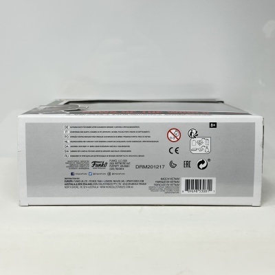 Lado da caixa com advertências, informações do fabricante Funko e código de barras