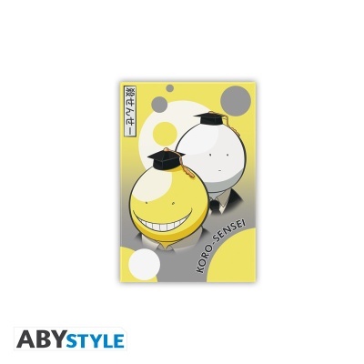 Capa de caderno com personagens amarelo e cinza com capelos de formatura e texto KORO-SENSEI