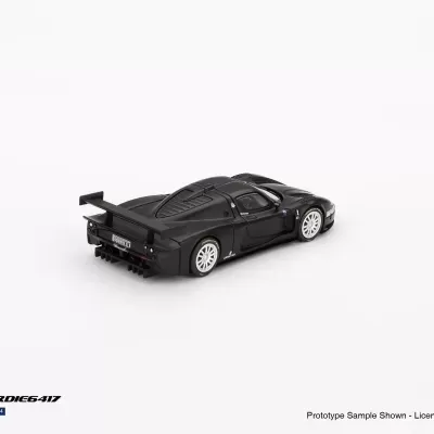 Miniatura de carro desportivo preto com rodas brancas e asa traseira em fundo branco