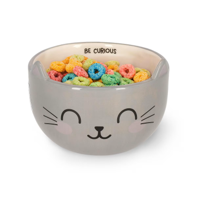 Tigela de cerâmica cinza com rosto de gato e cereais coloridos