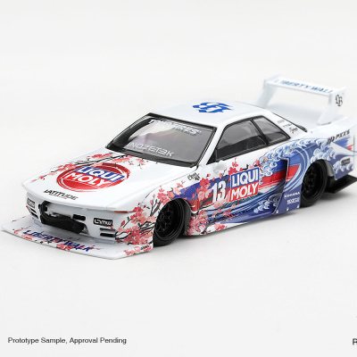 Miniatura de carro de corridas branco decorado com flores rosas e ondas azuis, logos LIQUI MOLY e número 13.