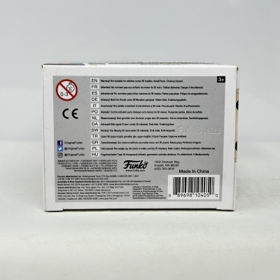 Caixa branca com texto de aviso multilingue e código de barras