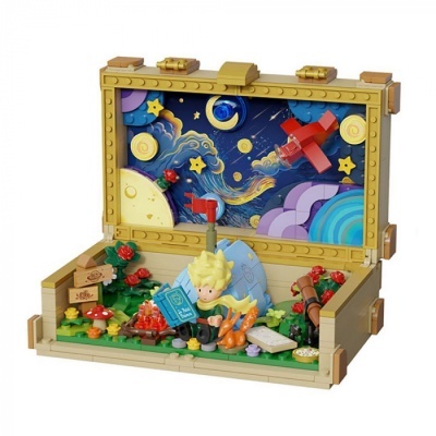 Conjunto de blocos de construção com personagem loiro, coelho, livro azul e céu estrelado colorido