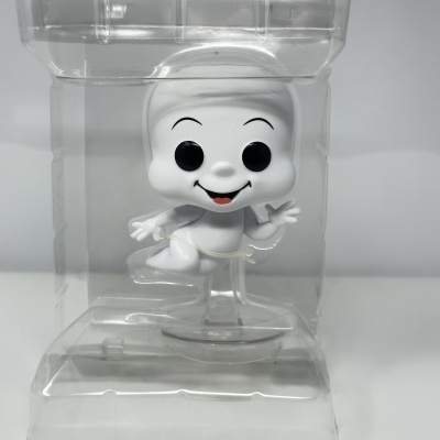 Figura Funko Pop branca sorridente em embalagem transparente