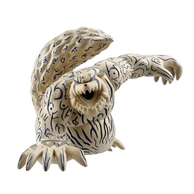 Figurine de criatura em plástico creme com desenhos pretos