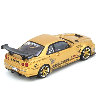 Miniatura carro desportivo dourado com spoiler preto e várias inscrições