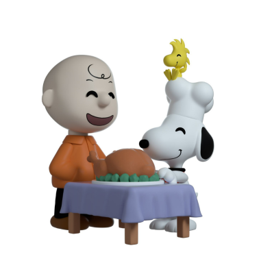 Figuras de Charlie Brown e Snoopy com mesa e prato de peru