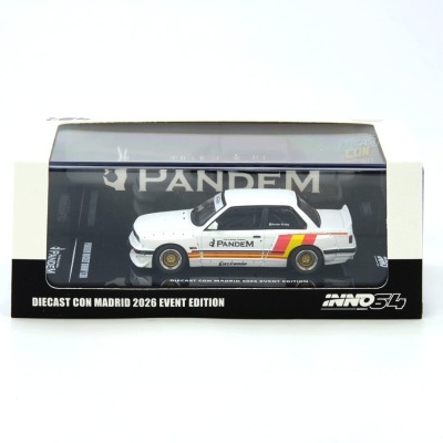 Miniatura de automóvel branco com decoração colorida em caixa transparente