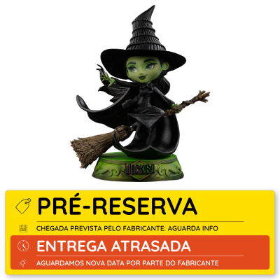 Estatueta de bruxa verde com chapéu preto e vassoura em base verde com texto WICKED