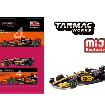 Modelo miniatura de carro Fórmula 1 preto, laranja e amarelo com logos e embalagem