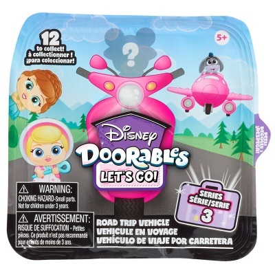 Brinquedo Disney Doorables Let's Go com veículo de viagem rodoviária cor de rosa e embalagem colorida
