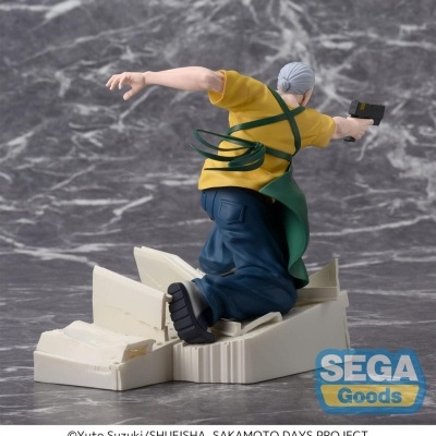 Figurina de personagem masculino com pistola e avental sobre base branca quebrada