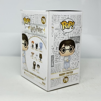 Caixa Funko Pop! Harry Potter nº 79 branca com texto e figura de desenho animado.