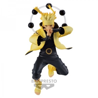 Figura colecionável do personagem Naruto em roupa preta e amarela com bolas pretas ao redor da cabeça