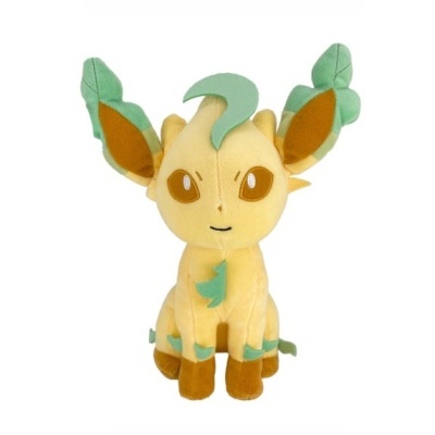 Pelúcia de personagem amarelo com folhas verdes e patas castanhas