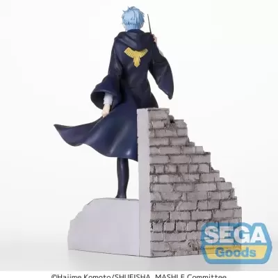 Figura colecionável de personagem com capa azul e base de parede de tijolos