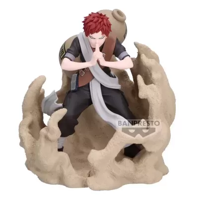 Figura de ação de personagem de anime com jarro e areia em volta