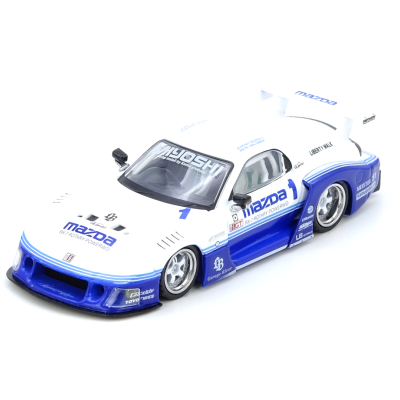 Miniatura de carro de corrida Mazda RX-7 branco e azul com texto e jantes prateadas.