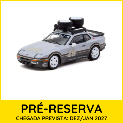 Miniatura de carro Porsche cinza com pneus no tejadilho