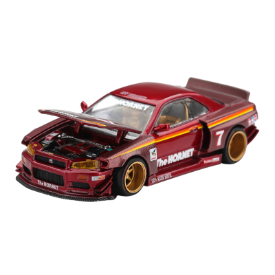 Miniatura de carro desportivo vermelho com detalhes em amarelo e dourado com capô e portas abertos