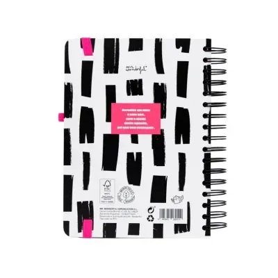 Parte traseira de agenda com design branco e preto e elásticos rosa
