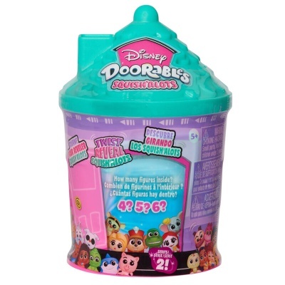 Embalagem Disney Doorables Squishalots roxa com tampa verde em forma de casa