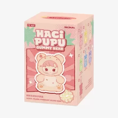 Caixa rosa com boneco vestido de urso e texto HACI PUPU GUMMY BEAR