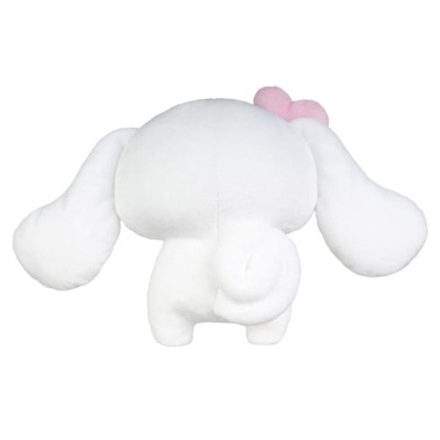 Pelúcia de cão branco com orelhas compridas e flor rosa vista de costas