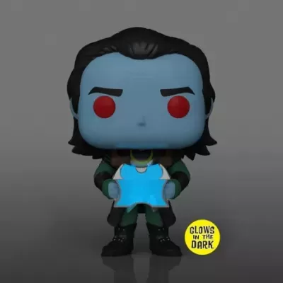 Figura Funko Pop azul com olhos vermelhos segurando peça azul, selo brilha no escuro.