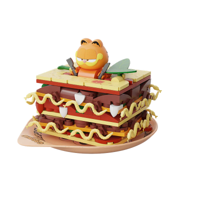 Figura de brinquedo de Garfield numa lasanha feita de peças tipo LEGO