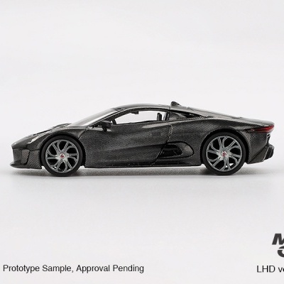 Modelo de carro desportivo miniatura cinza escuro em fundo branco com texto