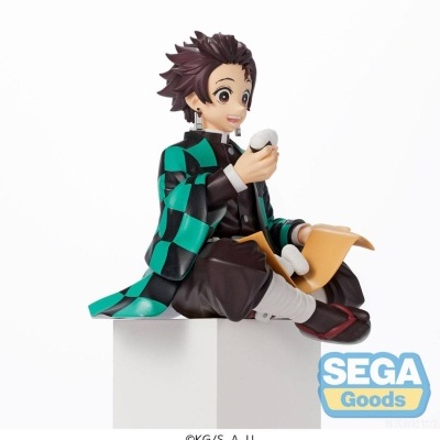 Figura Tanjiro Kamado anime Demon Slayer com roupa quadriculada e segurando onigiri