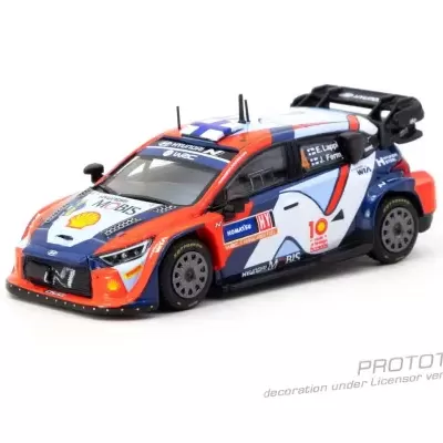 Miniatura de carro de corrida Hyundai Rally WRC azul, vermelho e branco em fundo branco