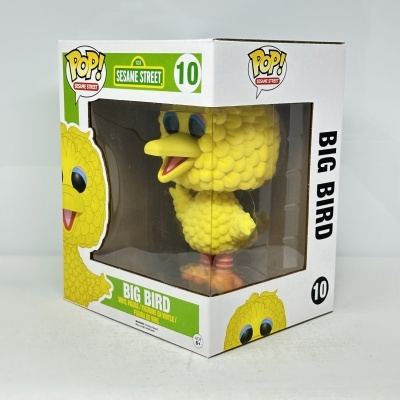 Figura Big Bird amarelo Sesame Street numa caixa de vinil