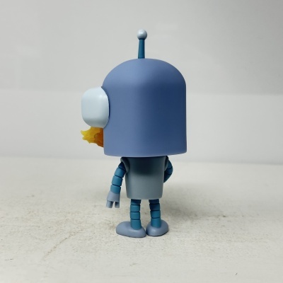 Figura de ação plástica azul com cabeça grande e antena