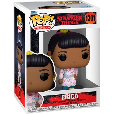 Figura Funko Pop! da personagem Erica de Stranger Things, com vestido rosa e avental branco, dentro de caixa de embalagem.