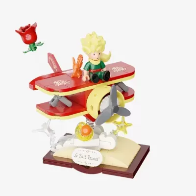 Brinquedo modelo avião biplano com personagem e elementos do Pequeno Príncipe