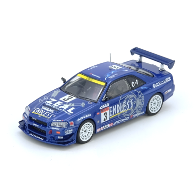 Miniatura de carro de corrida azul com jantes brancas e decalques